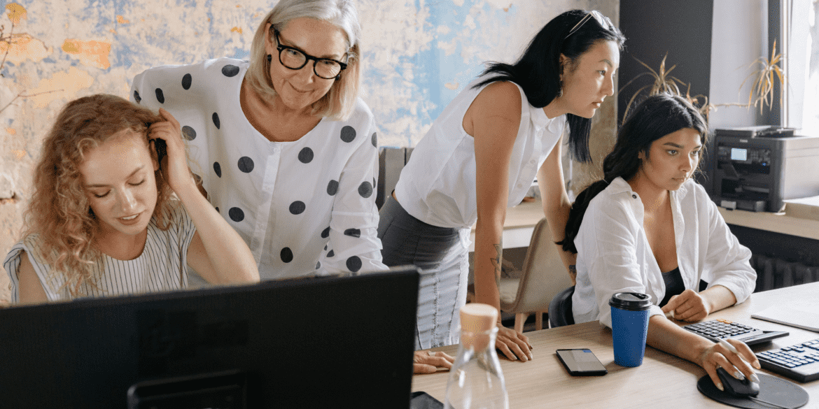 Office workers cooperating to support operational alignment