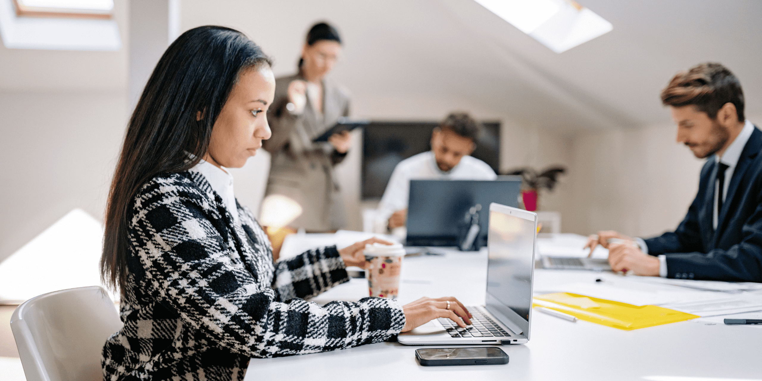 Employees working together to support scaling operations